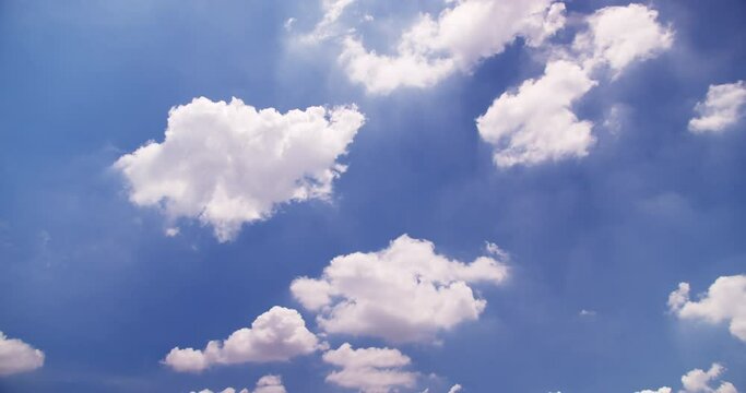 Beautiful blue sky with clouds on bright sunny day for abstract background.