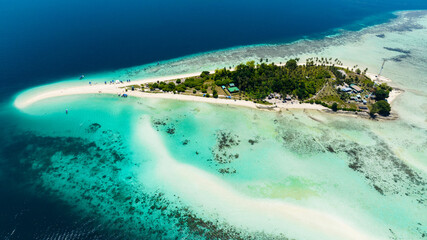 A beautiful Sibuan island with a beach and a coral atoll. Tun Sakaran Marine Park. Borneo, Sabah,...