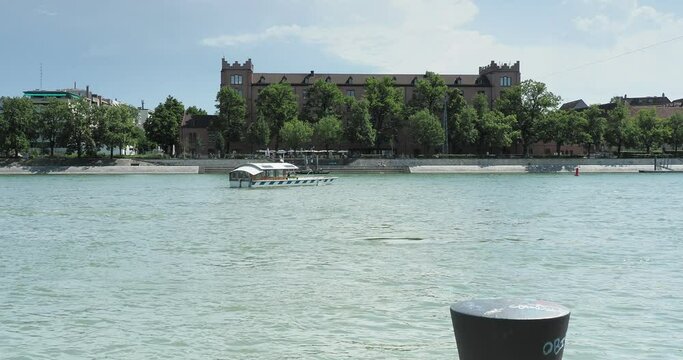 Swiss. Basel City.  Banks and ferries on the rhine. Cable ferry across the Rhine between City and old medieval City (Kleinbasel) with view of  Klingental museum and kHaus