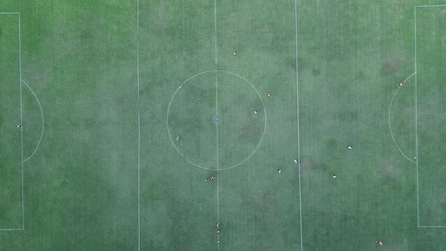 Aerial View of Football Stadion Mandala Krida. The soccer club is practicing sparring at Stadium in Yogyakarta with field and running tracks.