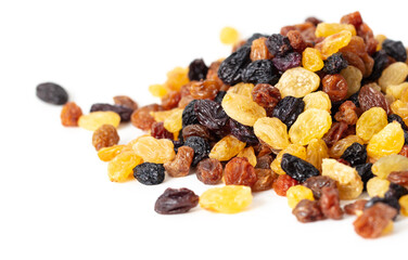 Black and yellow raisins isolated on white background.