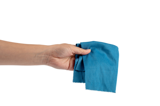 Hand and crumpled microfiber cleaning cloth, isolated on transparent background