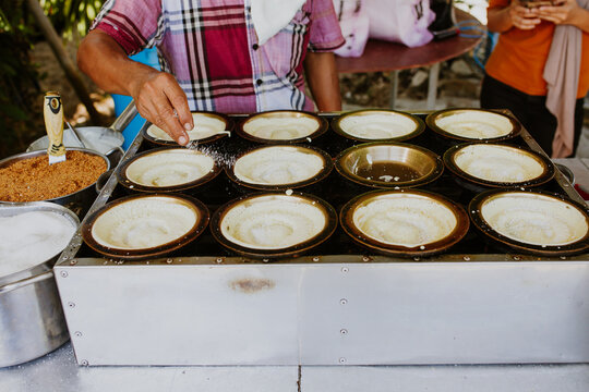 Apam balik is a Southeast Asian fluffy pancake with cream corn and peanuts.