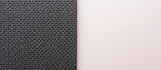 Fototapeta premium Photo of a black and white tie on a clean white background with copy space