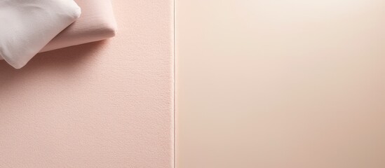 Photo of a white shirt hanging on a pink wall, with empty space for text or design with copy space
