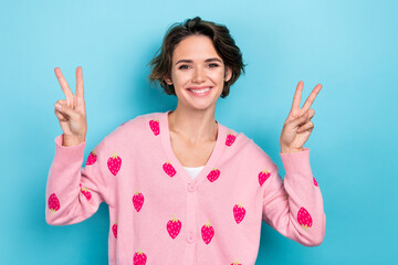 Photo of pretty nice sweet girl dressed stylish clothes show two arm v-sign celebrate seasonal discount isolated on blue color background