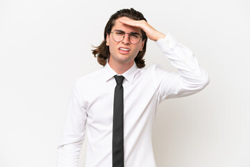 Business handsome man isolated on white background looking far away with hand to look something