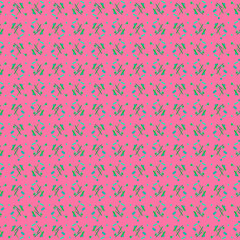 Delicate fun mosaic fabric pattern of green blue geometric shapes on a pink background