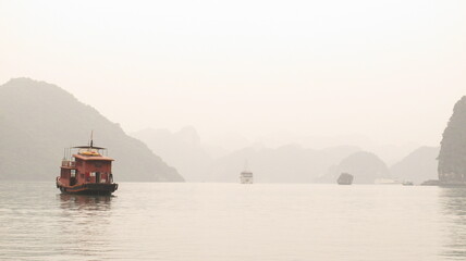 Sailing in Halong Bay during sunset