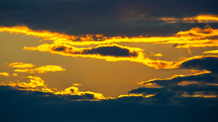 the expressive contrast of the clouds in the sky. sunset with bright clouds