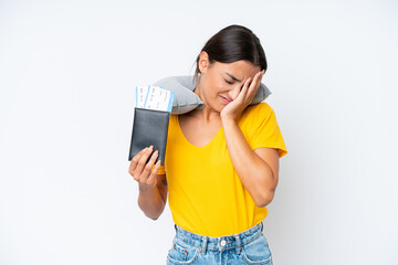 Woman with Inflatable Travel Pillow over isolated background with tired and sick expression