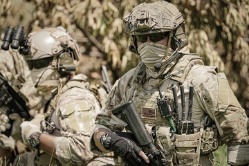United States Army ranger during the military operation. Professional marine soldiers training with...