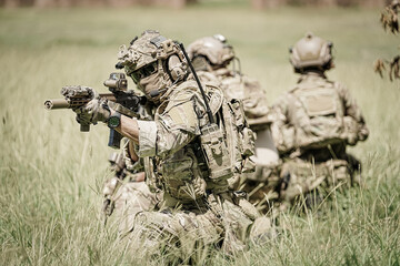 United States Army ranger during the military operation. Professional marine soldiers training with...