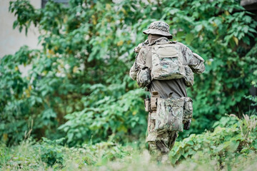 United States Army ranger during the military operation. Professional marine soldiers training with...