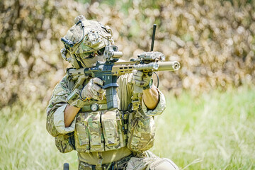 United States Army ranger during the military operation. Professional marine soldiers training with...