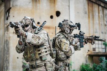 United States Army ranger during the military operation. Professional marine soldiers training with...