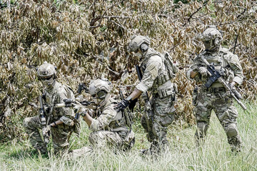 United States Army ranger during the military operation. Professional marine soldiers training with...