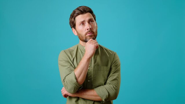 Bearded man makes Eureka gesture finding perfect solution