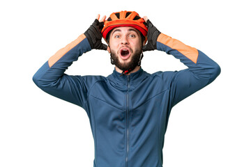 Young cyclist man over isolated chroma key background with surprise expression - obrazy, fototapety, plakaty