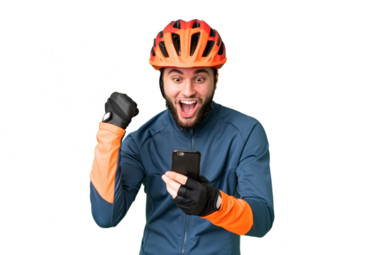 Young cyclist man over isolated chroma key background surprised and sending a message