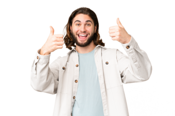 Young handsome man over isolated chroma key background giving a thumbs up gesture