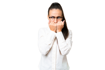 Young Arabian woman over isolated chroma key background nervous and scared putting hands to mouth