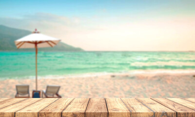 Wooden table. In nature background, blurred sea in summer season.