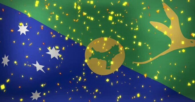 Animation of falling confetti over waving flag of christmas island in background