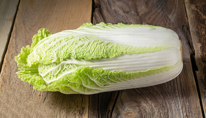 one whole fresh Chinese cabbage on old table