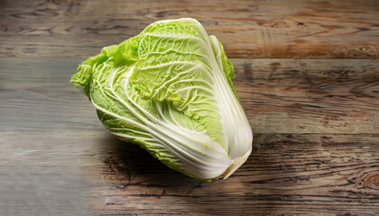 one whole fresh Chinese cabbage on old table