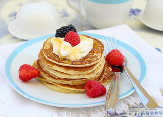 Sweet fritters with sour cream