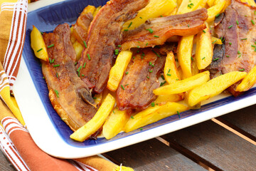 Roast fatty pork bacon slices