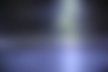 Dark black and gray background has a little abstract light.	