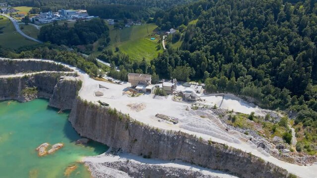 Stunning 4K drone footage of the quarry near Velenje in the country of Slovenia. Witness the raw beauty of extraction and industrial landscapes. Perfect for industrial themes.