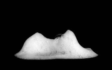 liquid white foam from soap or shampoo or shower gel Abstract soap bubbles. Set foam, soap bubble isolated on black, with clipping path texture and background.	
