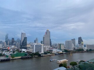 View from ICONSIAM shopping mall Saw many famous high-rise buildings in the center of Bangkok on a rainy evening in Thailand.

This is the original image from the iPhone 11.