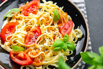 pasta fresh tomato tagliatelle meal food snack on the table copy space food background rustic top view