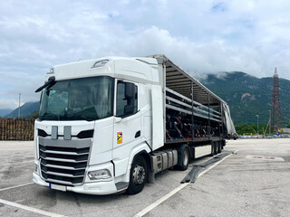Fototapeta na wymiar Cargo transportation of driving driven axles in a semi-trailer truck