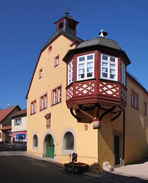 Renaissance town hall with half-timbered oriel window in the old village of Frei-Laubersheim in Germany