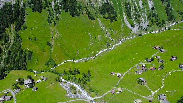 Unterschachen village at the base of staubifall waterfall, Switzerland alps