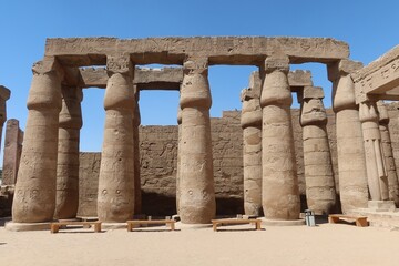 Fototapeta premium The great stone columns and statues in Luxor temple in the East bank in Egypt