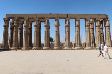 The great stone columns and statues in Luxor temple in the East bank in  Egypt