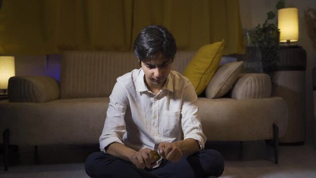 The man who wants to commit suicide by taking pills.