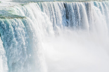 Fototapeta na wymiar Strong rapids on the American - Canadian waterfalls Niagara Falls. 