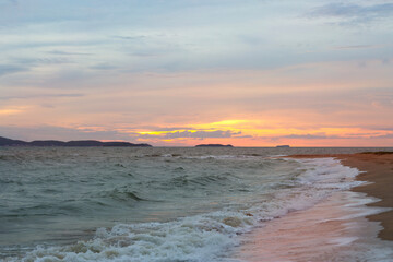 Fototapeta na wymiar Raging Sea with Sunset Sky Background