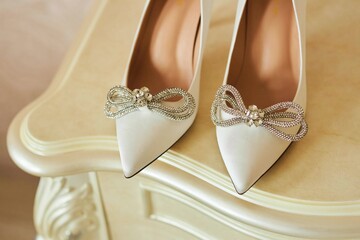 Beautiful white women's shoes with rhinestones. Shoes for weddings or special events.