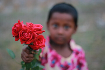 A boy with rose
