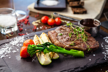 Black Angus New York steak. Marbled beef sirloin from Uruguay. Delicious healthy traditional food closeup served for lunch in modern gourmet cuisine restaurant - 625919963