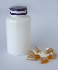 tablets with a jar on a white background