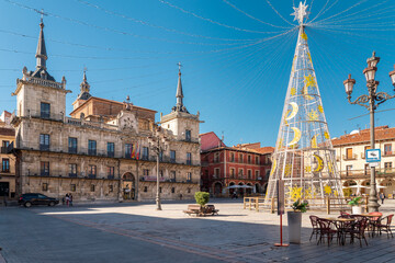 Leon, Spain - November 12 2022: Christmas tree in the city center of Leon in Plaza Mayor Square. 
Streets of Leon decorated with lights and ornaments in anticipation of the Christmas celebration. 